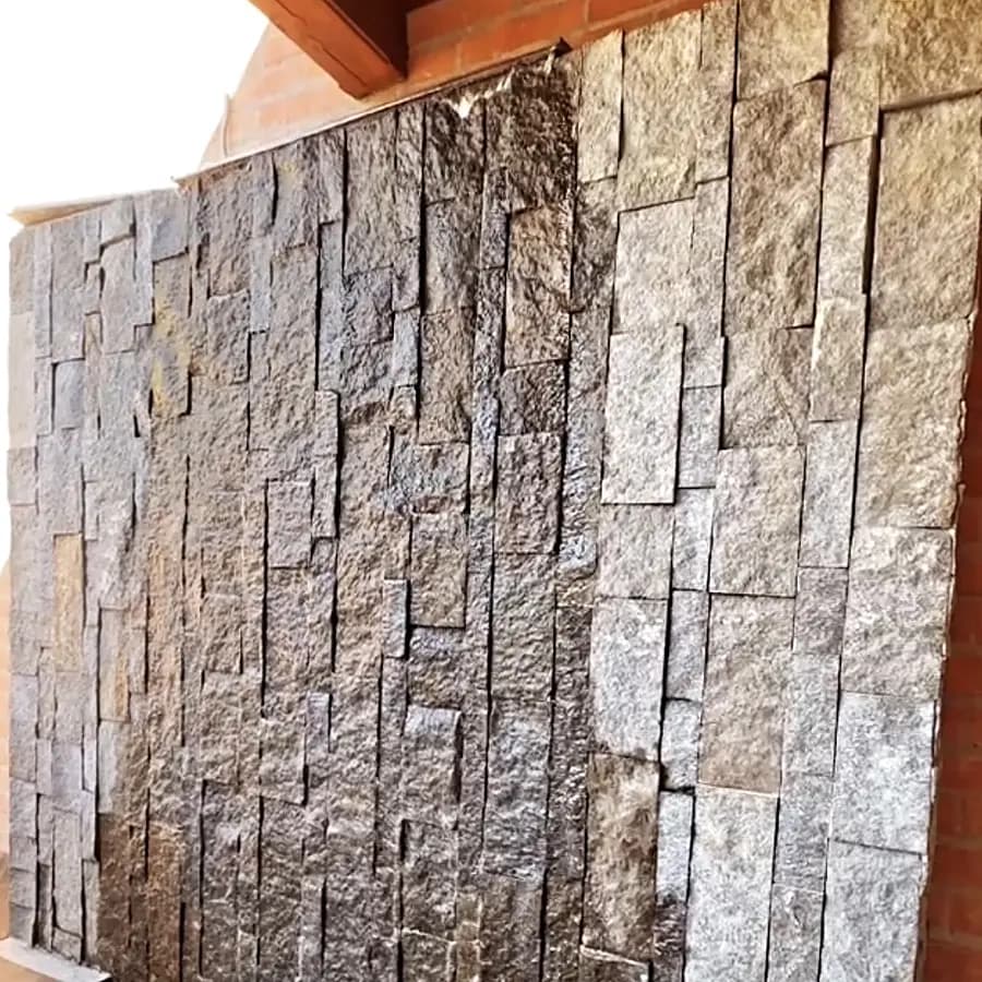 Close-up of finished stacked stone veneer on a feature wall in Tucson